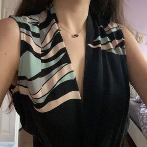 Vintage Diane Von Furstenburg silk wrap black sleeveless blouse abstract print